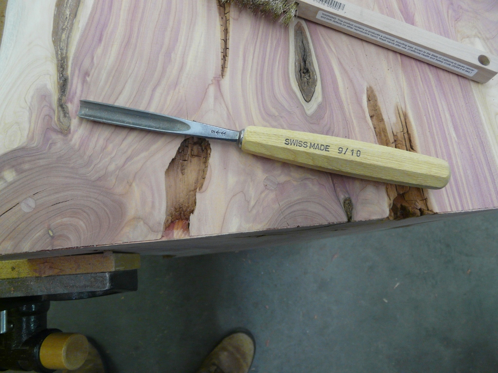 I had to blend on of the voids in the top with the leg.  A carving chisel did the job.