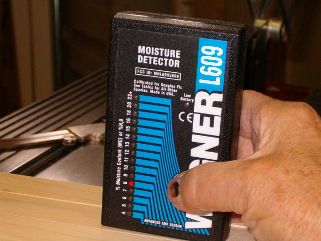 Pinless Moisture meter showing 8% water.jpg