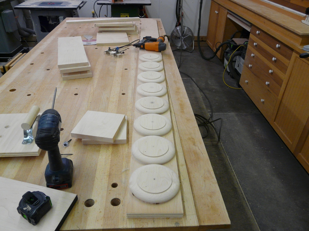 The wheels on the bus go round and round.  Until you nail them to a board!