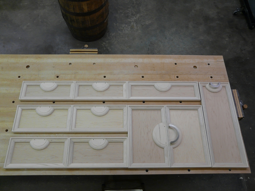 Love them or hate them these 7 drawer fronts and 3 doors are designed around some fancy pulls.  Myself I lean toward the latter.