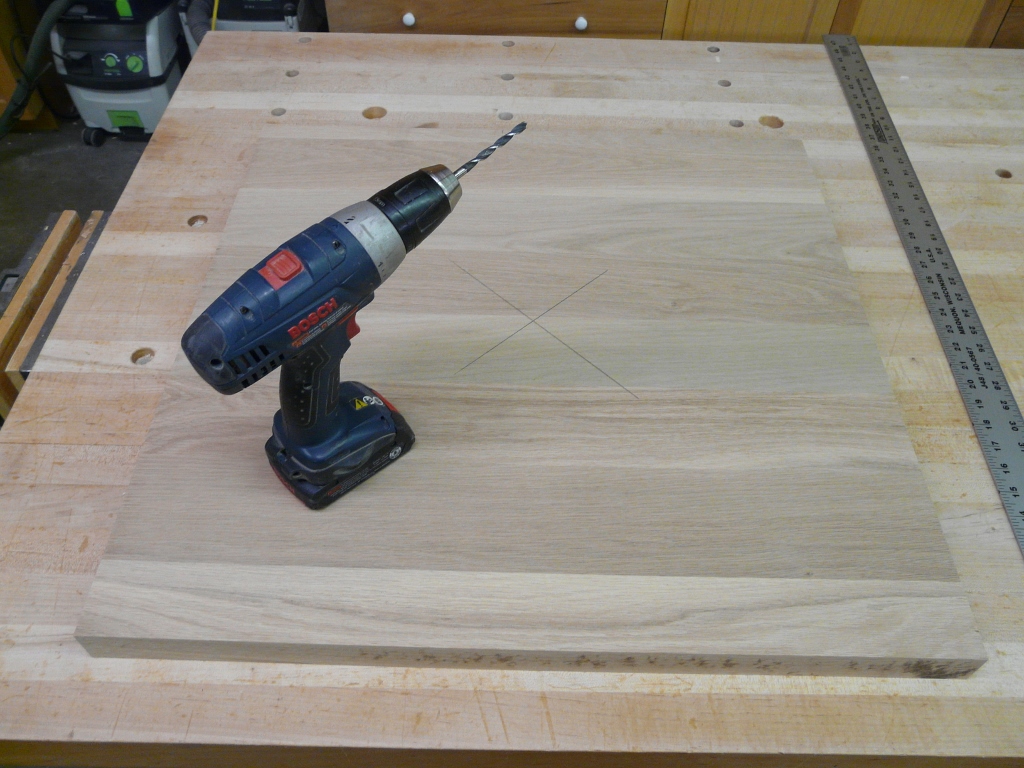 One perfect square 26 x 26. X marks the spot for a 1/4" hole 1/4" deep.