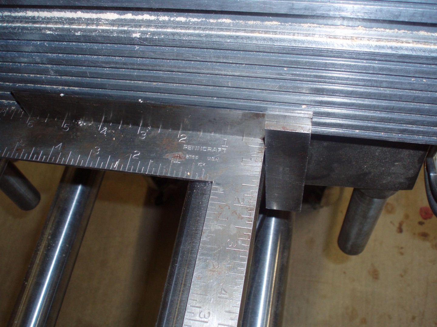 Aligned at one end of square with Way Tube