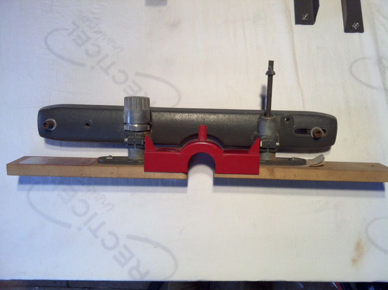 This is the piece - It has two clamps on the back. Any clues?