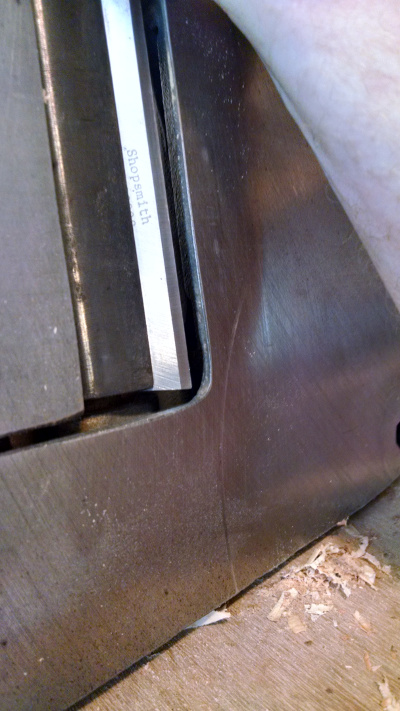 Clearance when infeed table is bottomed out beyond zero (infeed is ABOVE outfeed)