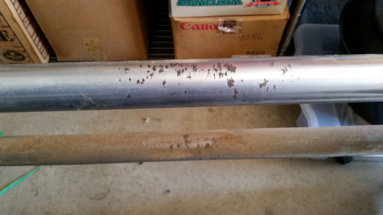 Way tubes, showing corrosion.  Top tube was wiped clean, the lower tube shows how dirty it is.