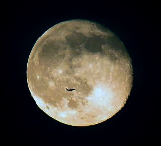 Eds moon shot with plane.jpg