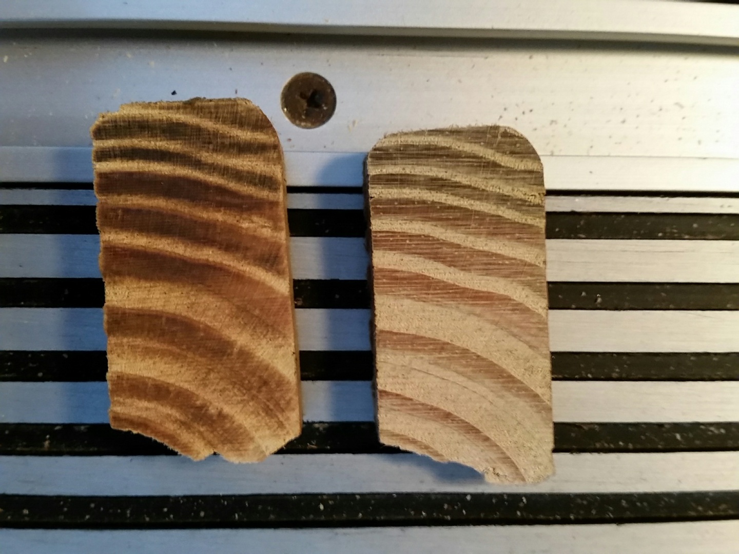 Two cuts, one burned, with dull blade, one nice and clean, with new blade.