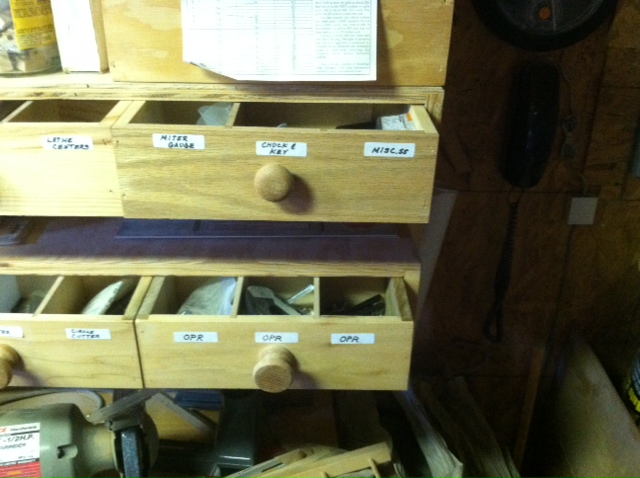 small drawers holding lots of Shopsmith stuff