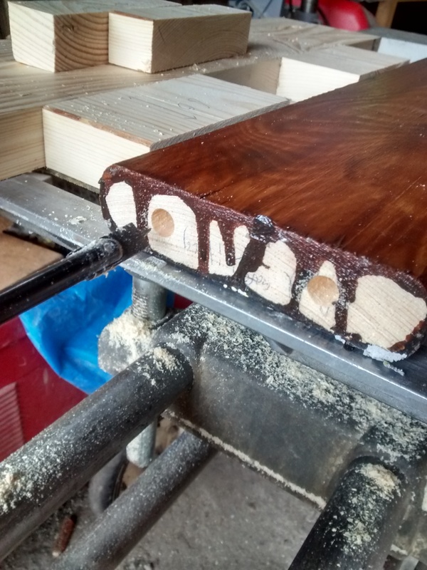 I used spacer blocks to repeatable offset dowel holes on 30mm centers.