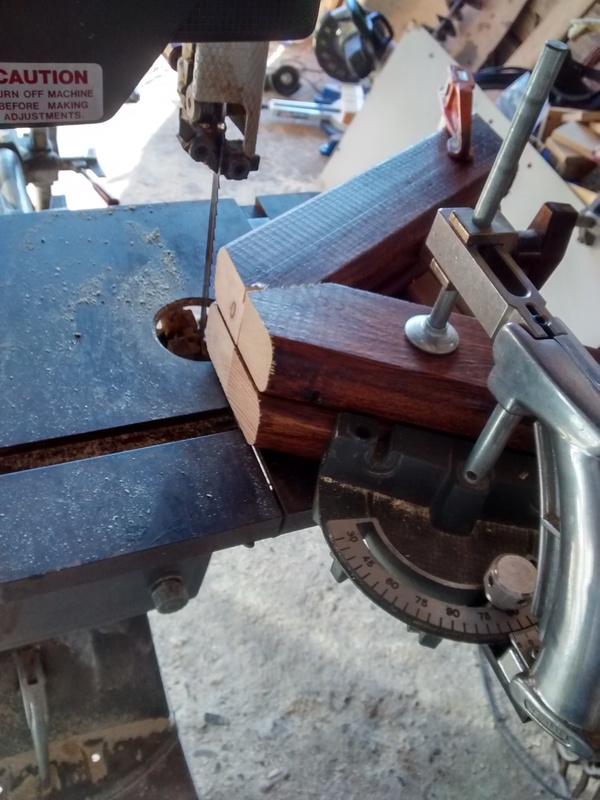 Trimming top of stool legs to be equal height.