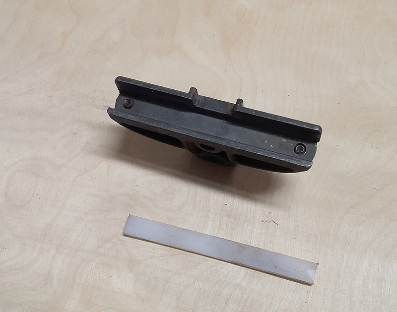 Pieces used the fence clamp base and the UHMW (Ultra High Molecular Wear) strip I cut to fit.