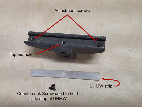 showing the tapped hole and countersunk screw to hold the UHMW