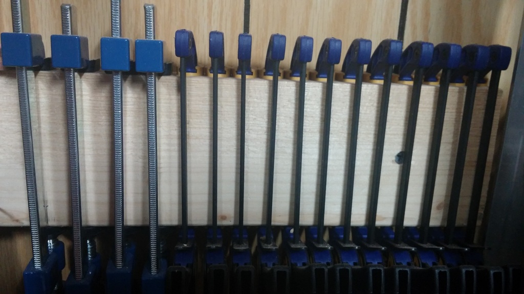 Some small clamps on a 2x4