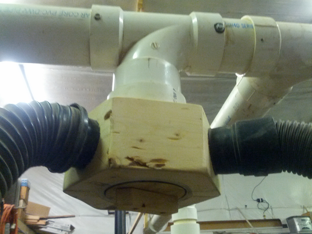 Installed in 3" dust line.  after glue up of blocks either turn the center hole or cut out on a bandsaw.