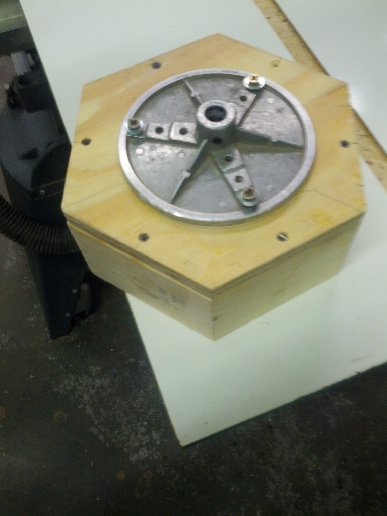 Hexagon with 3/4" plywood and faceplate. Remove screws where ports are to be drilled after glue up.