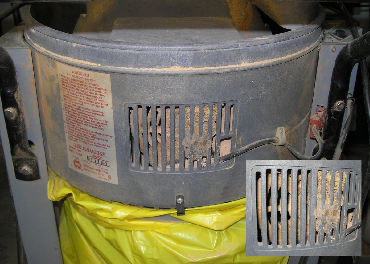 Mud Dabbers Nest on motor air inlet