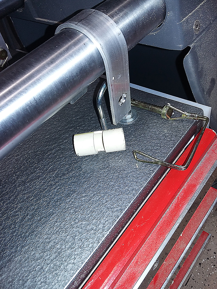 Linch Pin ready to install with centering spacer (White Object wit slot cut in it for U-Bolt.