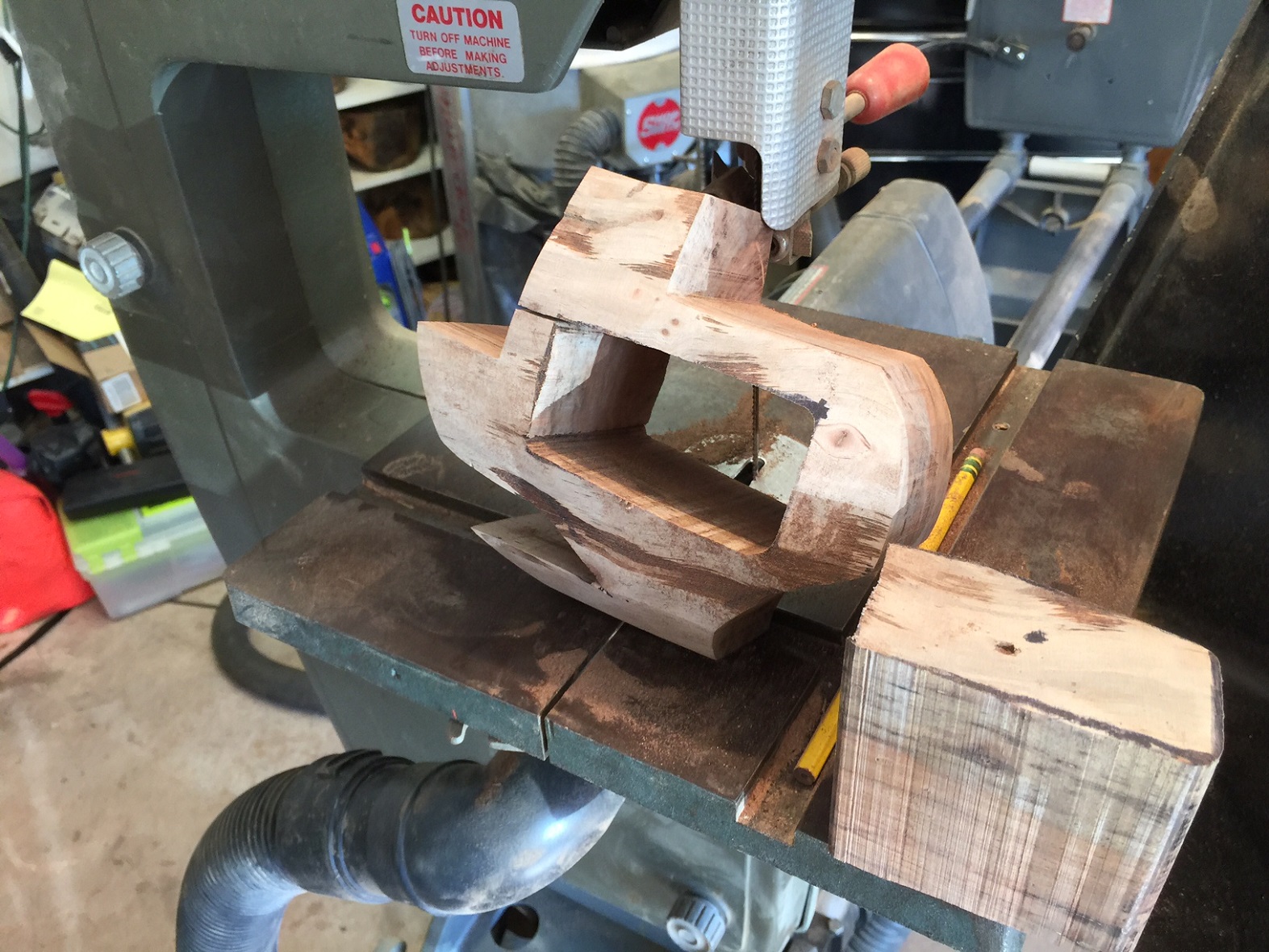 You can see thru the block. You will now glue the back slice back onto the block to form the back of the drawer slot.