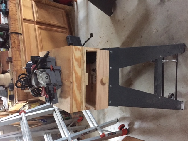 Drawer for manual, wrench, etc., added as an afterthought.