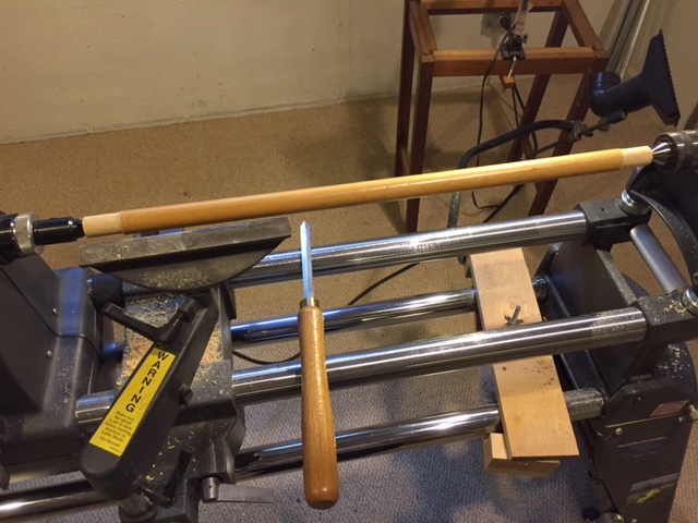 Turning down broom handle.jpg