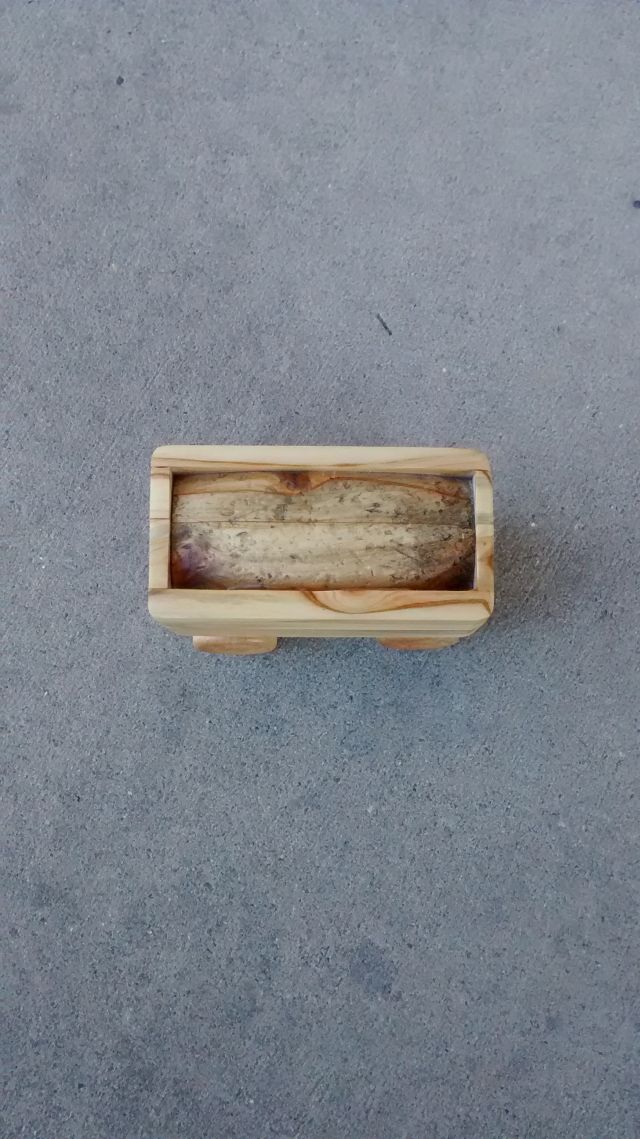 Top view showing concrete treatment and dark stain.