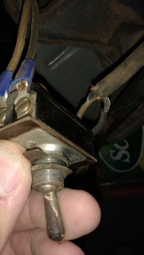 The switch wiring insulation was showing a little copper...