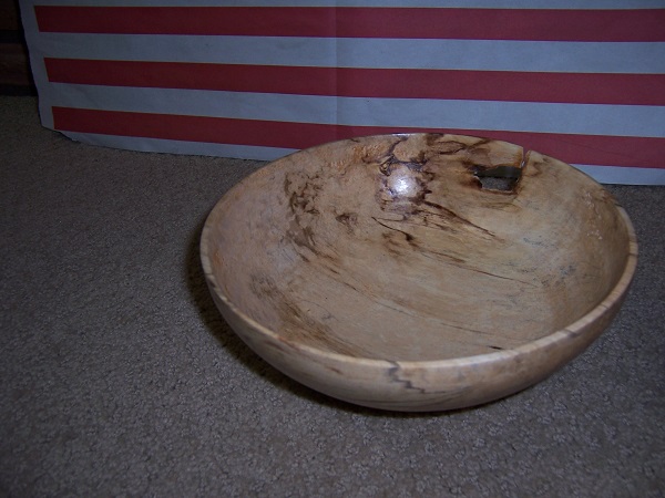 Notice the hole in the side. Weak spot in the wood where I think a branch was located. Gives it character.