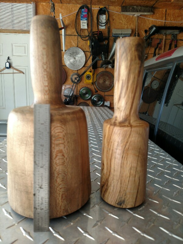 A couple mallets I turned from red oak. I made the smaller one today.