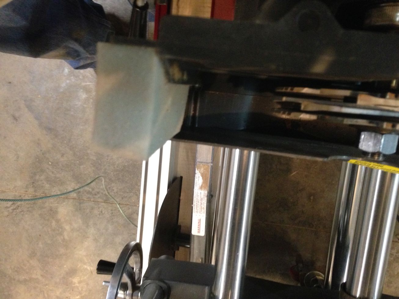 1"x1 3/4"x4" I used spray adhesive to attach to the lower saw guard.