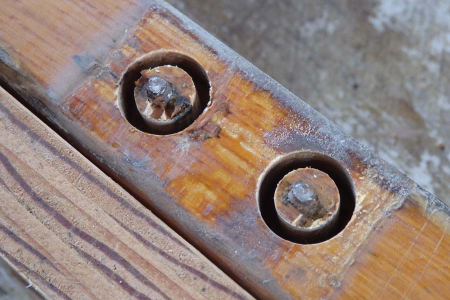 After drilling, wood chipped away until vice-grips could get a bite and remove screw