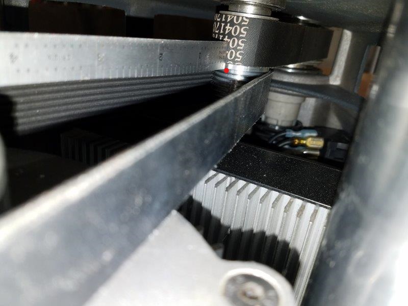 motor pulley straightedge at idler lip