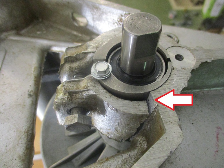 Broken Eccentric Bushing Retainer.JPG