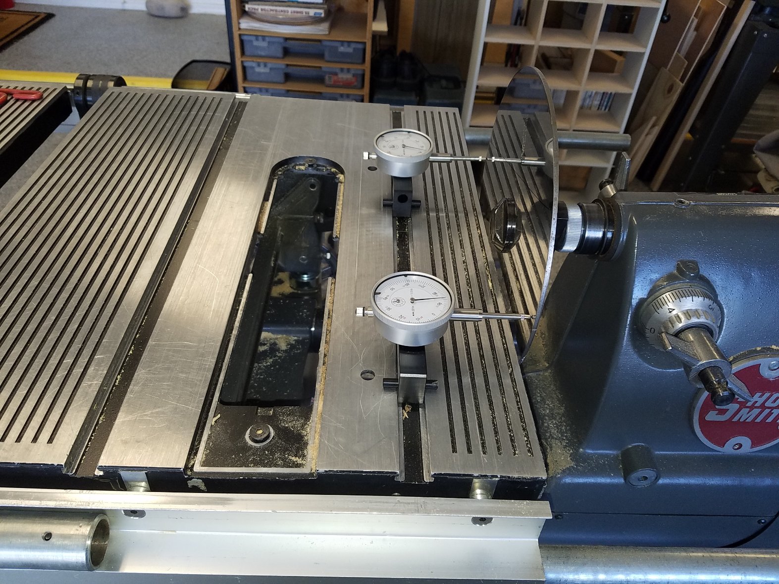 A pair of SuperBar Alignment Gauges and an Infinity Alignment Disk.