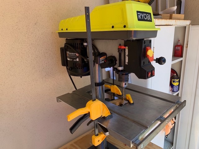 ShopSmith table placed over the pillar of the Ryobi drill press.