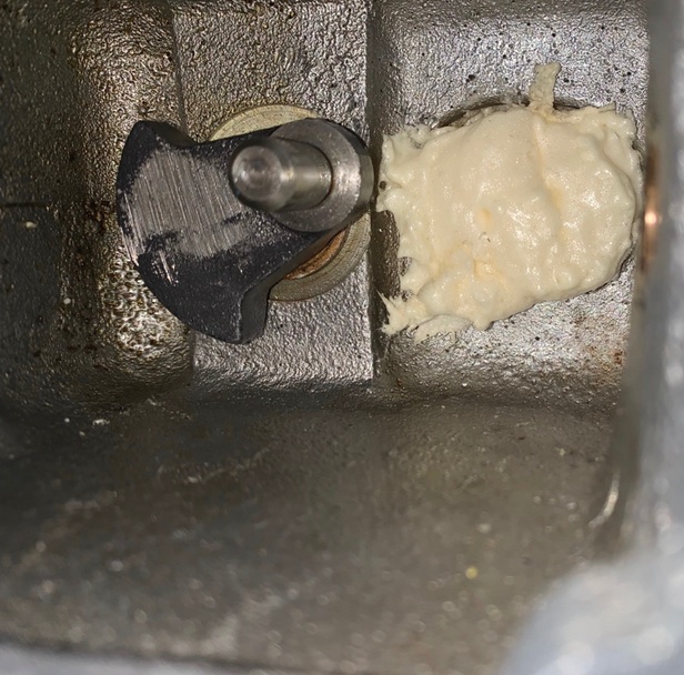 Close-up showing how filler was trimmed to avoid the rotating crank.