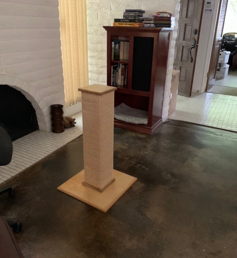 Cat Scratching Post, 32” tall, made with a sisal fiber rug.