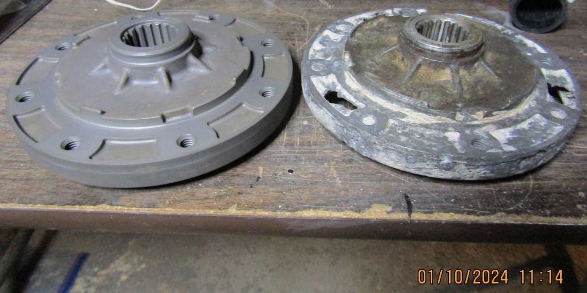 ANODIZED HUB 2 WITH OLD HUB.JPG