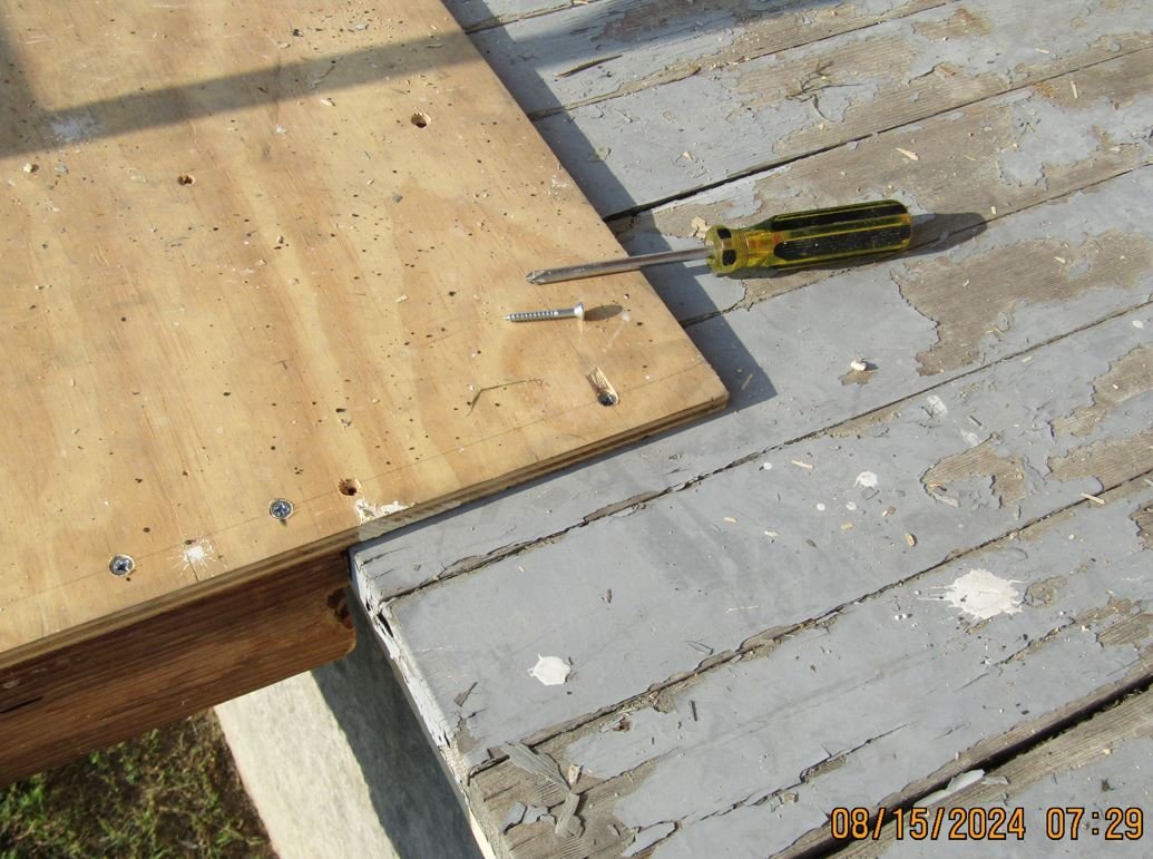 PLATFORM IS SCREWED TO PORCH FLOOR.JPG