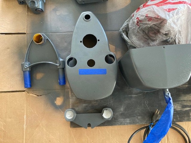 belt cover in original paint next to parts in SS touch-up paint