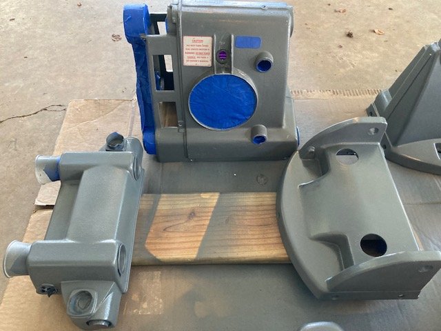 Headstock in original paint next to parts in SS touch-up paint