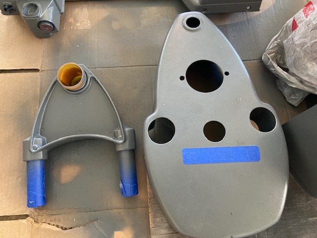 Close-up of original paint on belt cover beside parts painted in SS touch-up paint