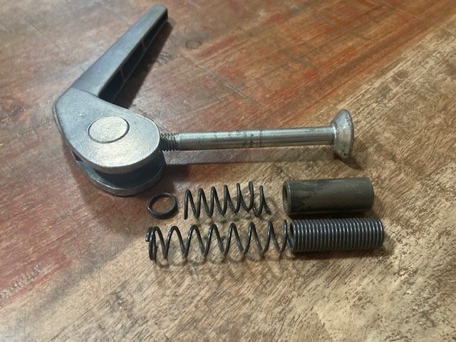 Side by Side momparison of old assembly vs. new spring design