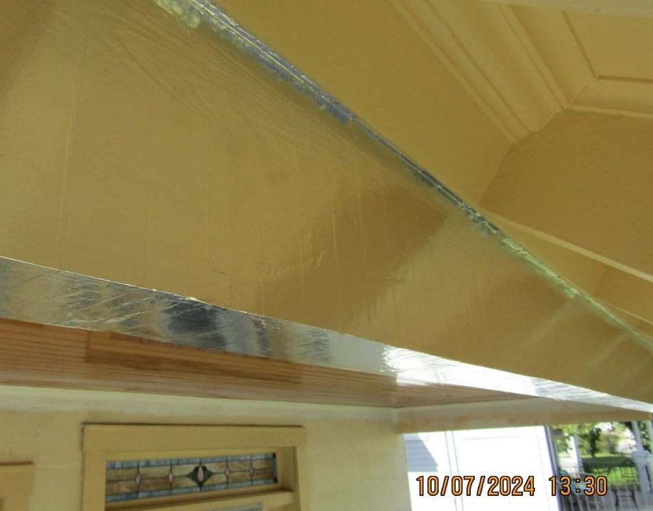 FOIL APPLIED TO OLD WOOD PORCH EAVES.JPG