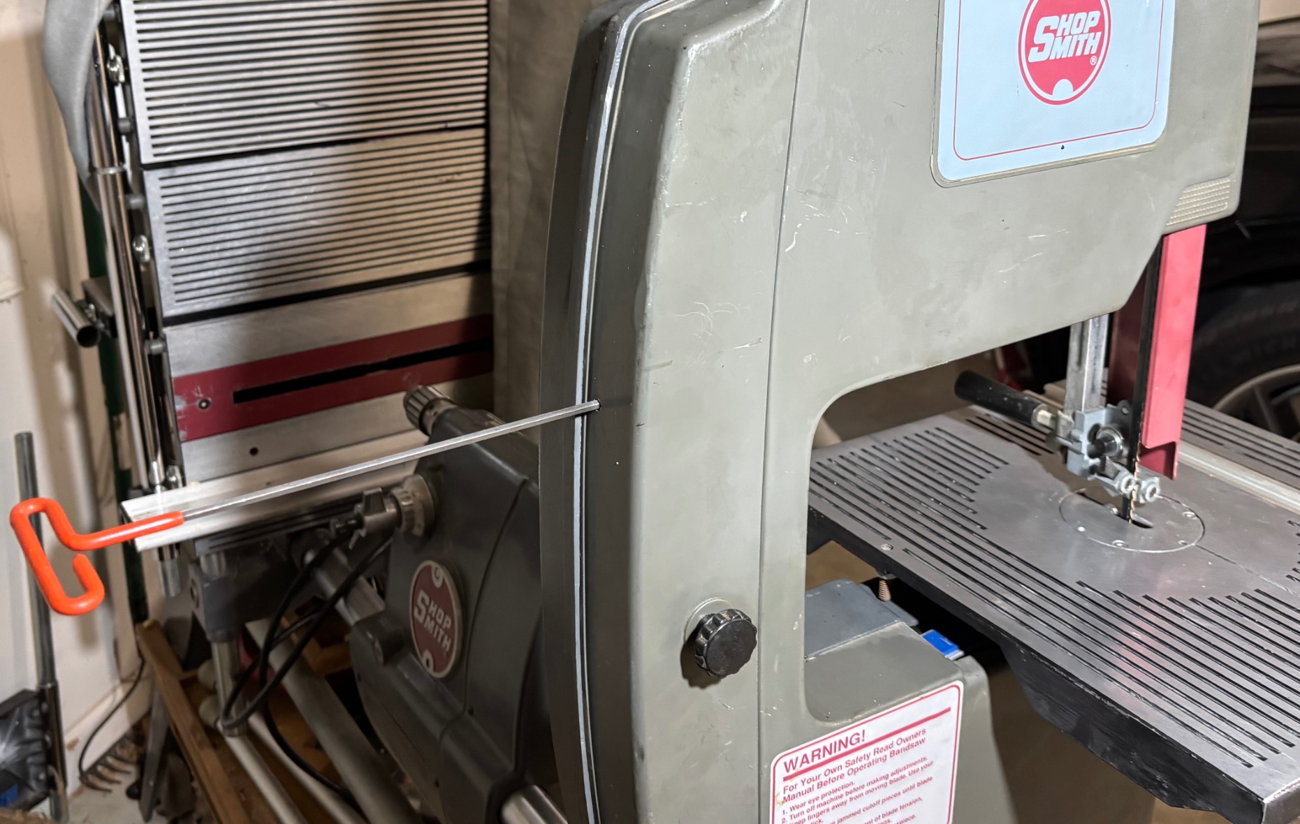 I drilled a hole to adjust the tension without opening the case.