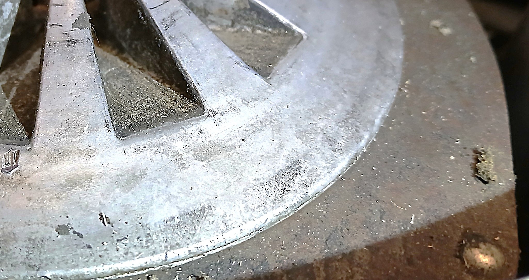 Fan sheave against the motor plate.